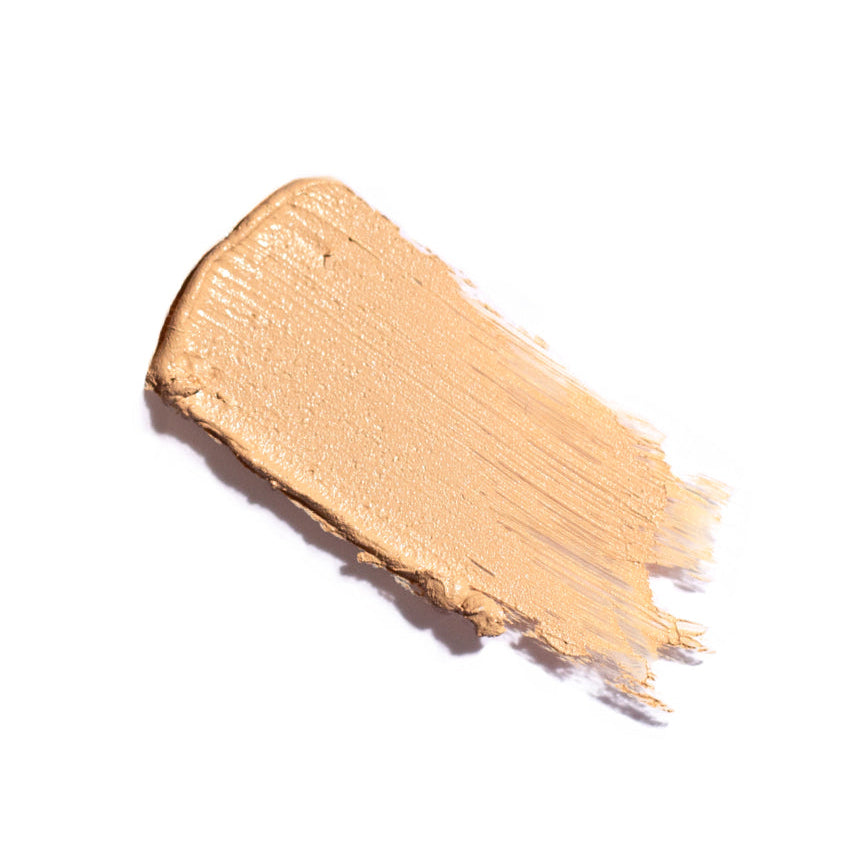 Beige makeup swatch on a white background